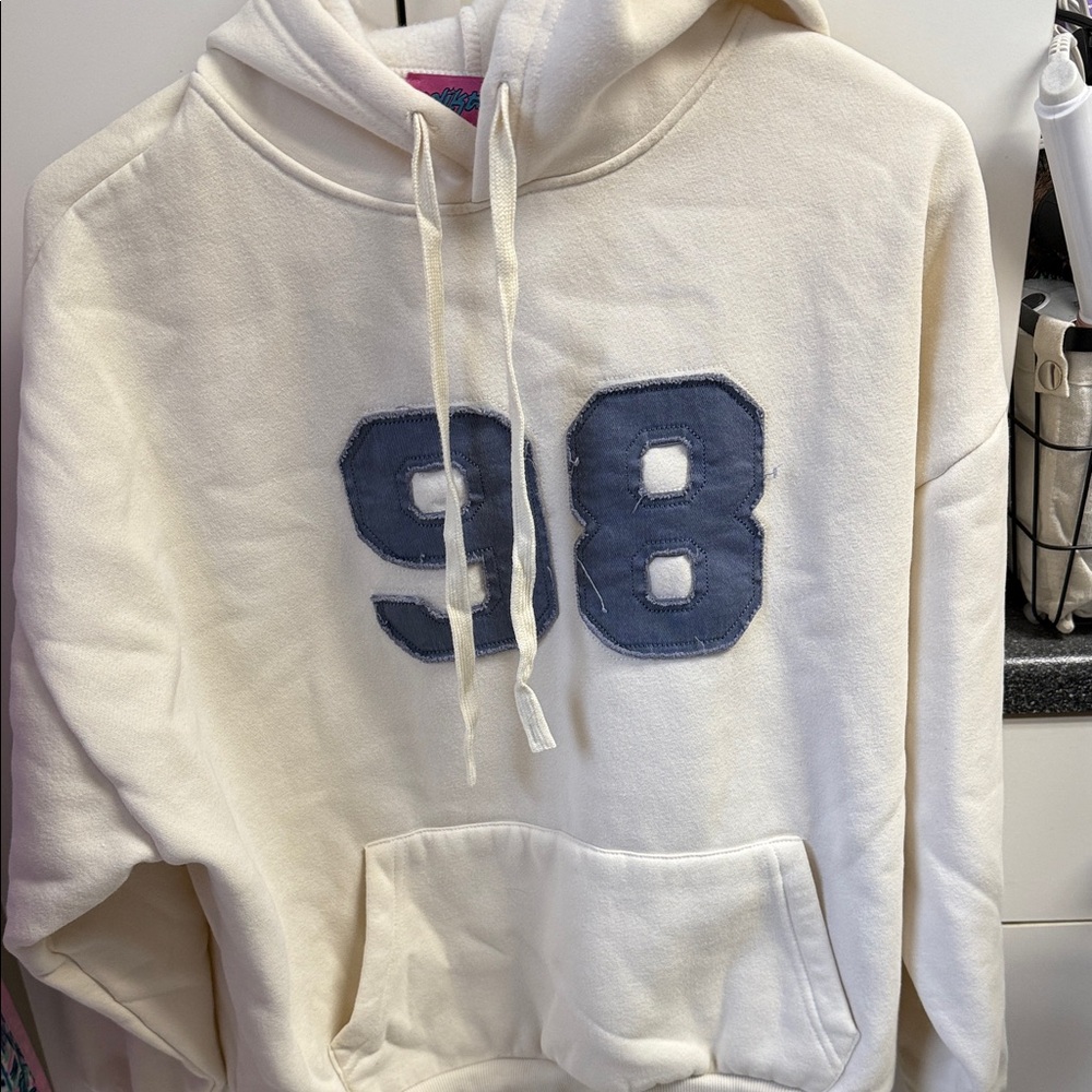 Edikted Cream Hoodie with Blue '98' Patch